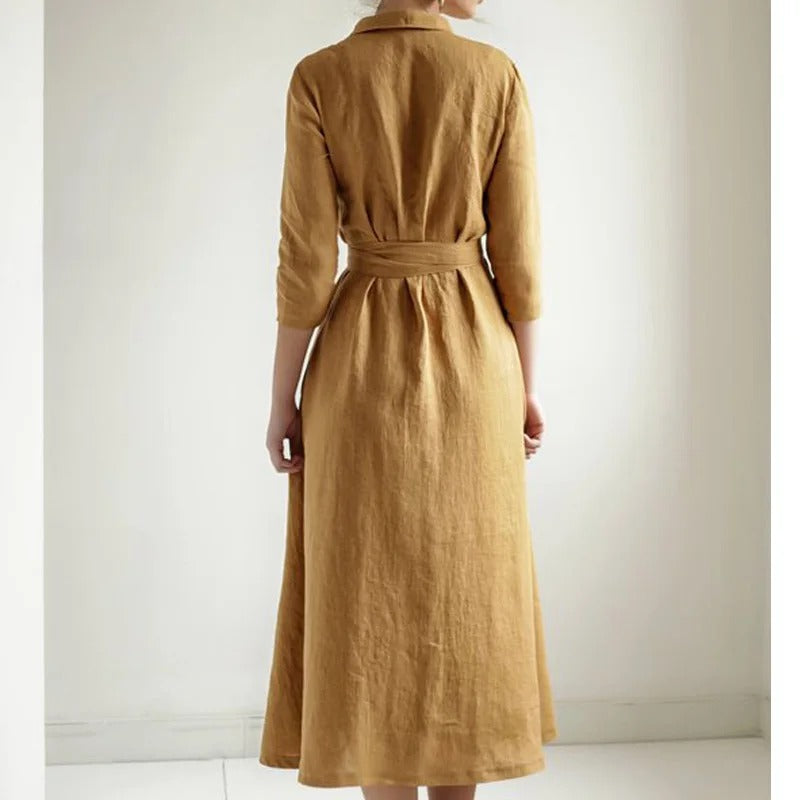 Mustard wrap midi dress with tie waist and three-quarter sleeves