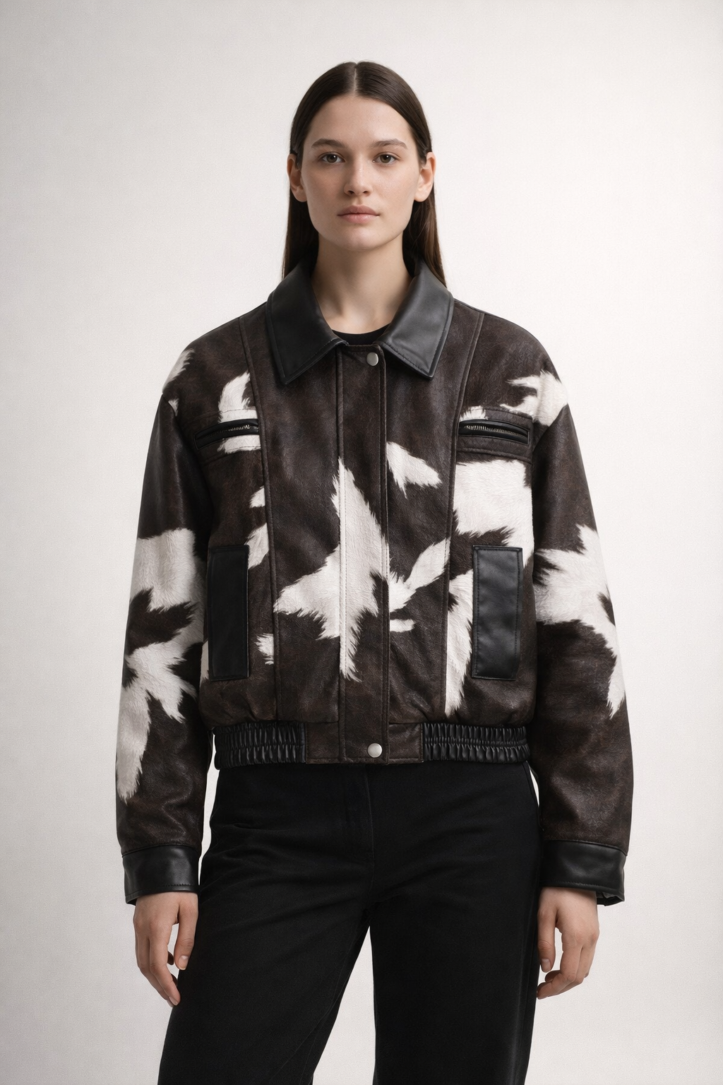 Black and white jacket with abstract pattern and elastic hem