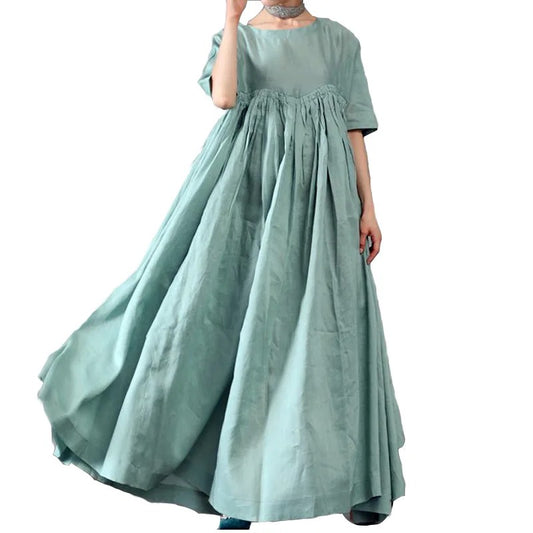 Light green maxi dress with gathered bodice and loose fit
