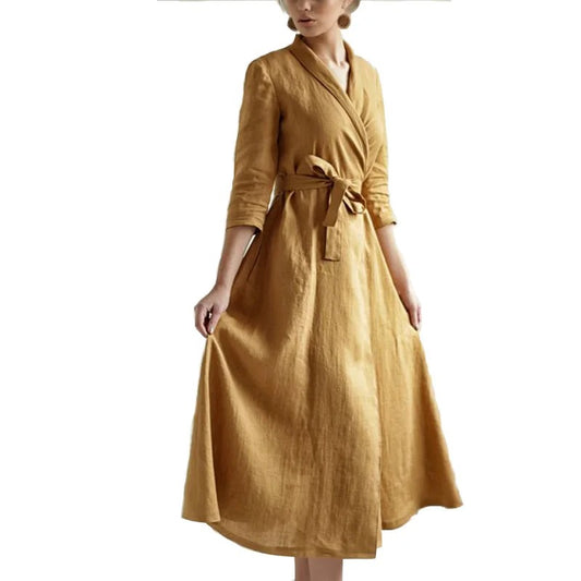 Mustard wrap midi dress with tie waist and three-quarter sleeves