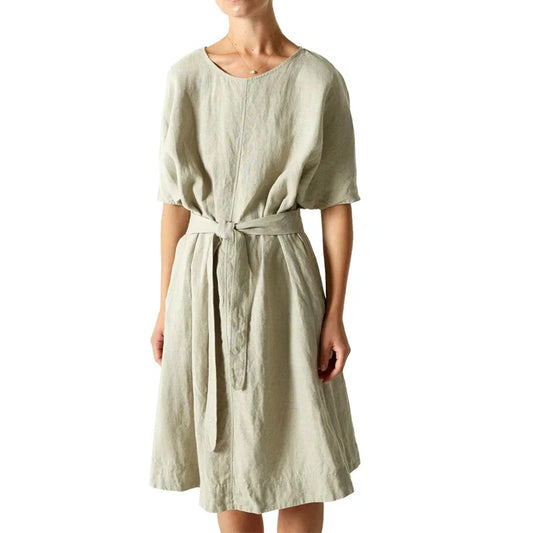 Light green knee-length dress with round neck and tie waist
