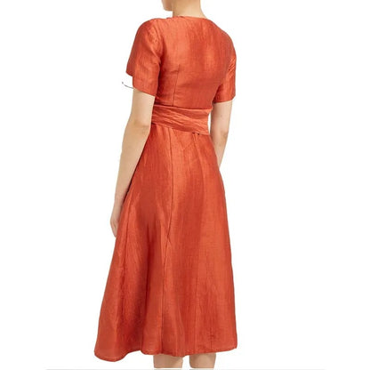 Rust orange midi dress with V-neck and waist tie detail