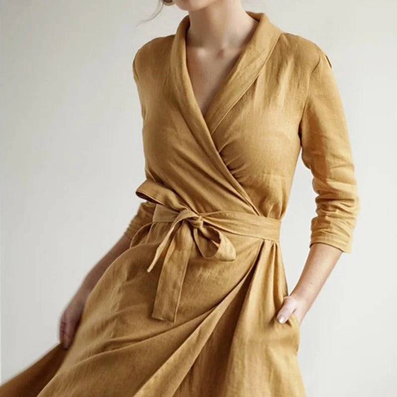 Mustard wrap midi dress with tie waist and three-quarter sleeves