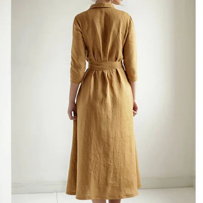 Mustard wrap midi dress with tie waist and three-quarter sleeves