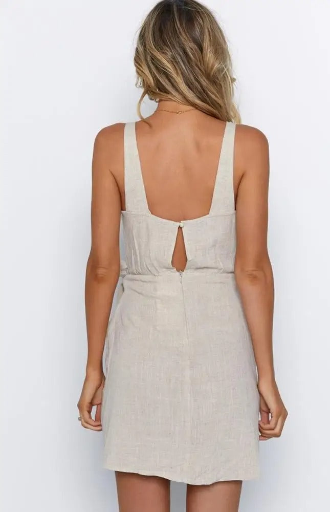 Beige wrap mini dress with deep V-neck and side tie