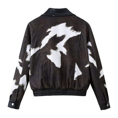 Black and white jacket with abstract pattern and elastic hem